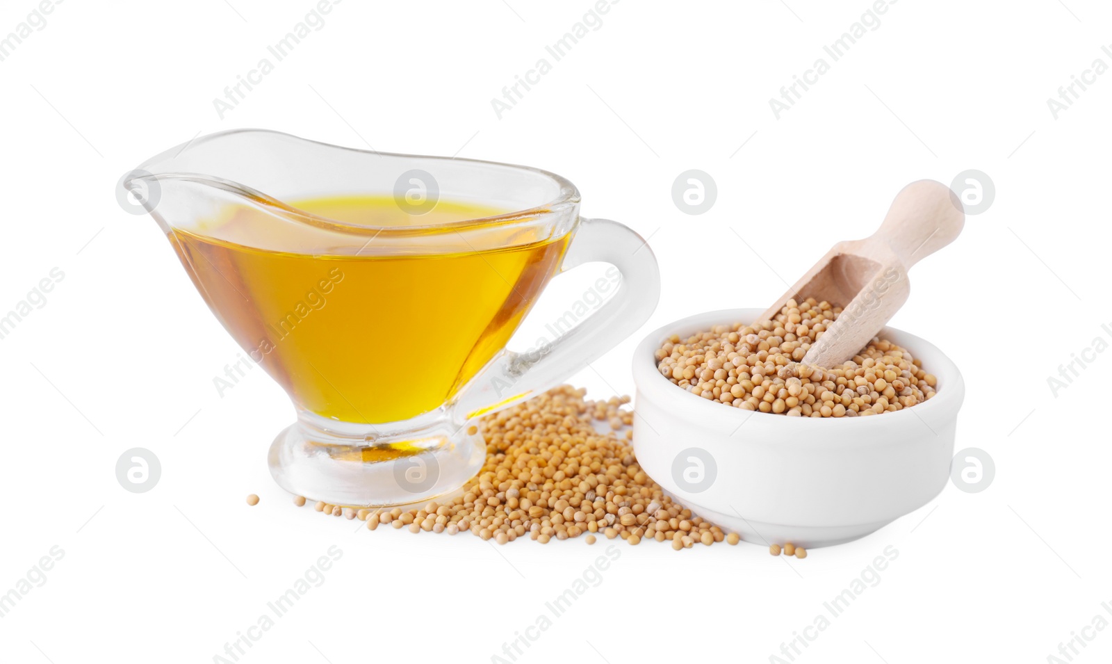 Jug of natural oil and mustard seeds on white background Photo of Jug of natural oil and mustard seeds on white background