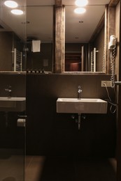 Stylish bathroom with sink in luxury hotel. Interior design