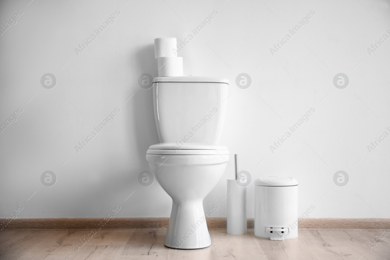 Photo of New ceramic toilet bowl in modern bathroom