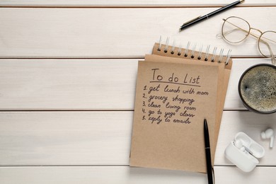 Photo of Flat lay composition with to do list on white wooden table, space for text
