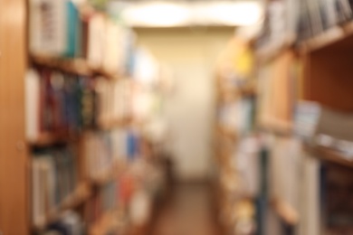 Blurred view of cabinets with books in library