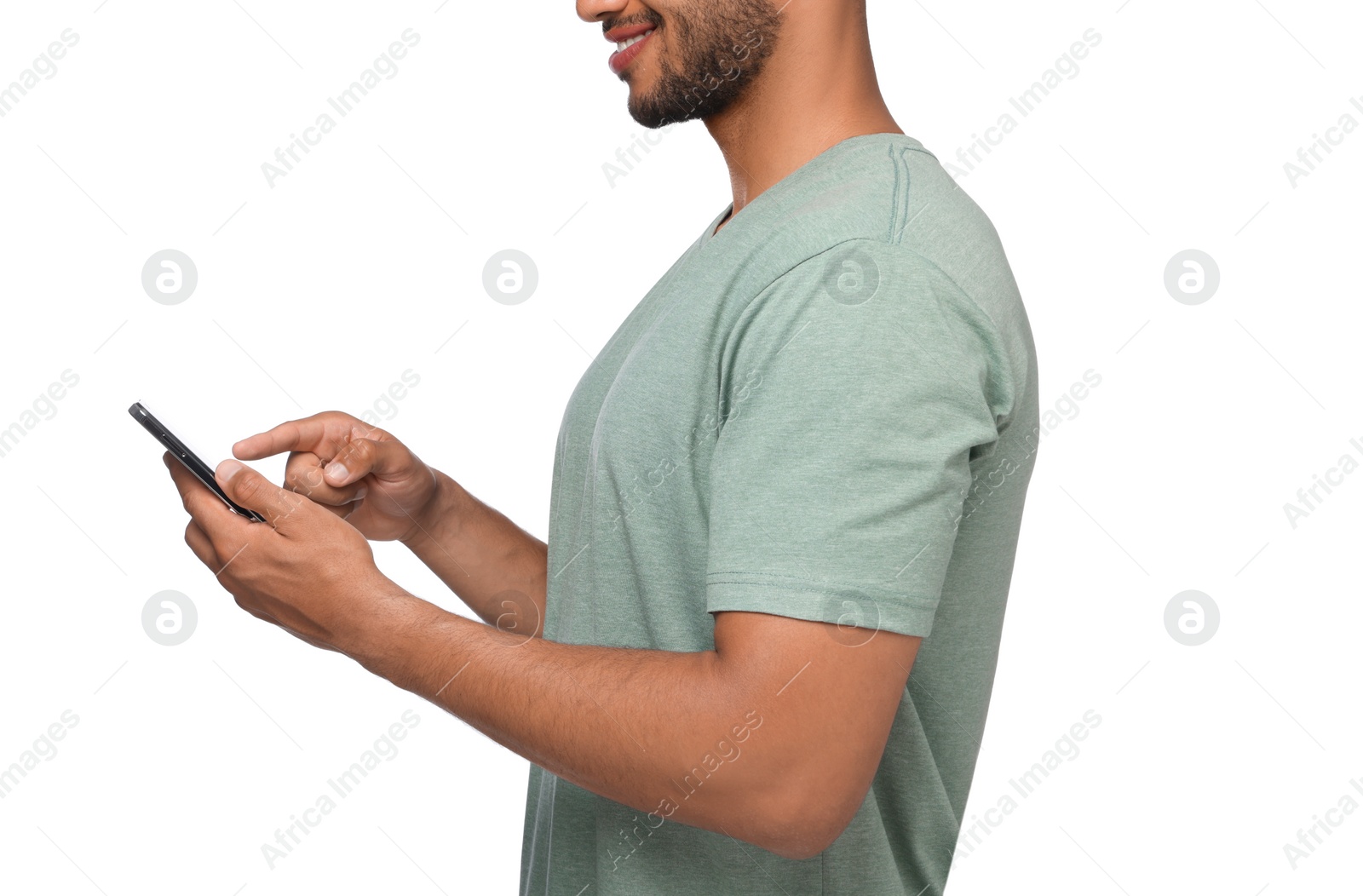 Photo of Man sending message via smartphone on white background, closeup