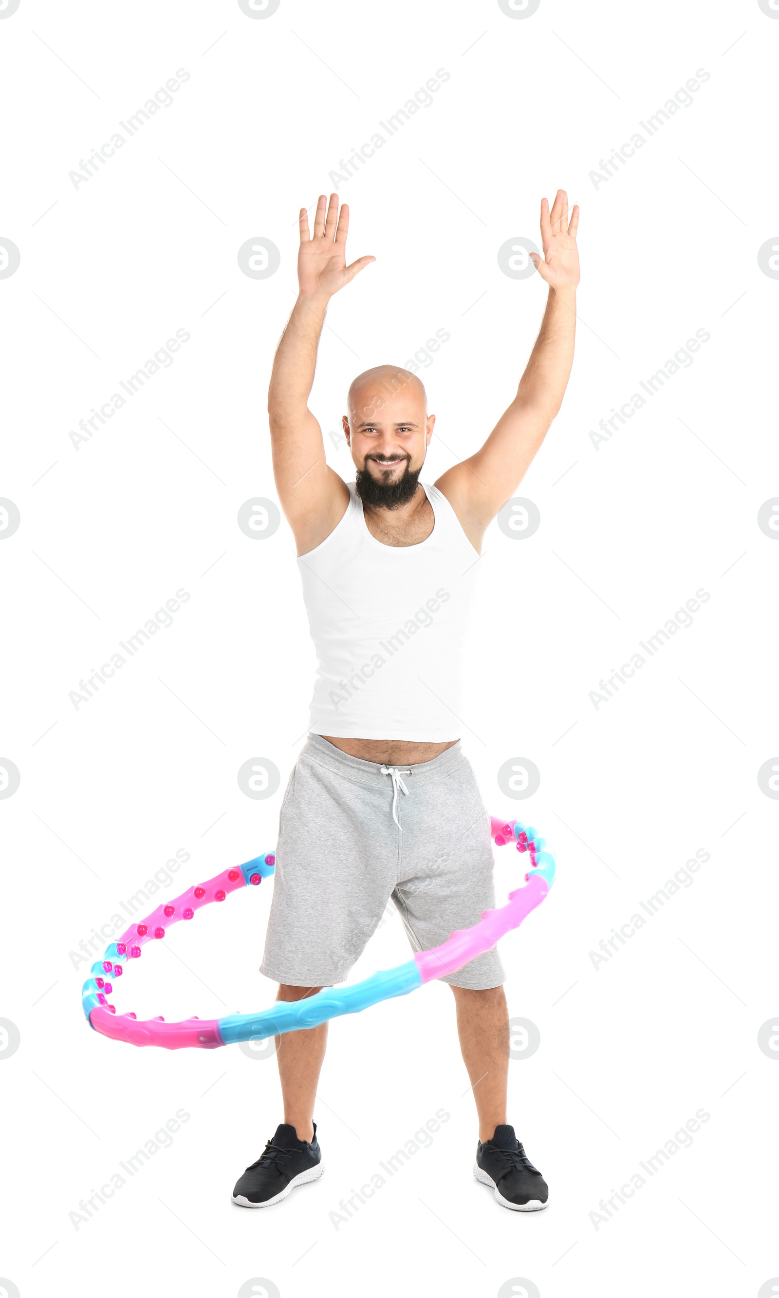 Photo of Overweight man with hula hoop on white background