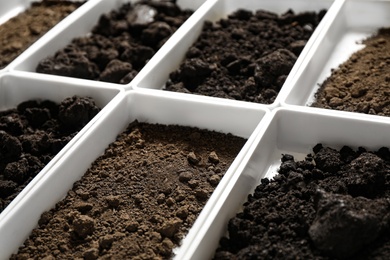 Containers with soil samples, closeup. Laboratory research