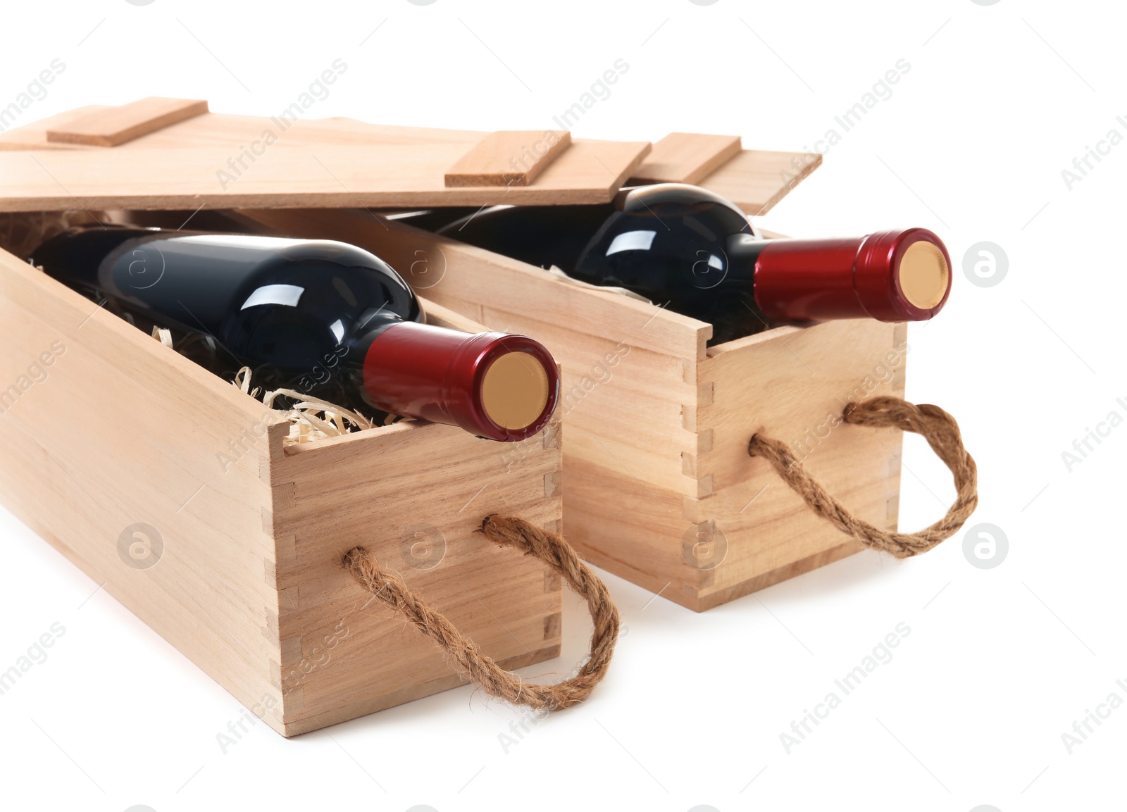 Photo of Wooden crates with expensive wine isolated on white