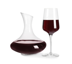 Photo of Glass and decanter of delicious expensive red wine on white background