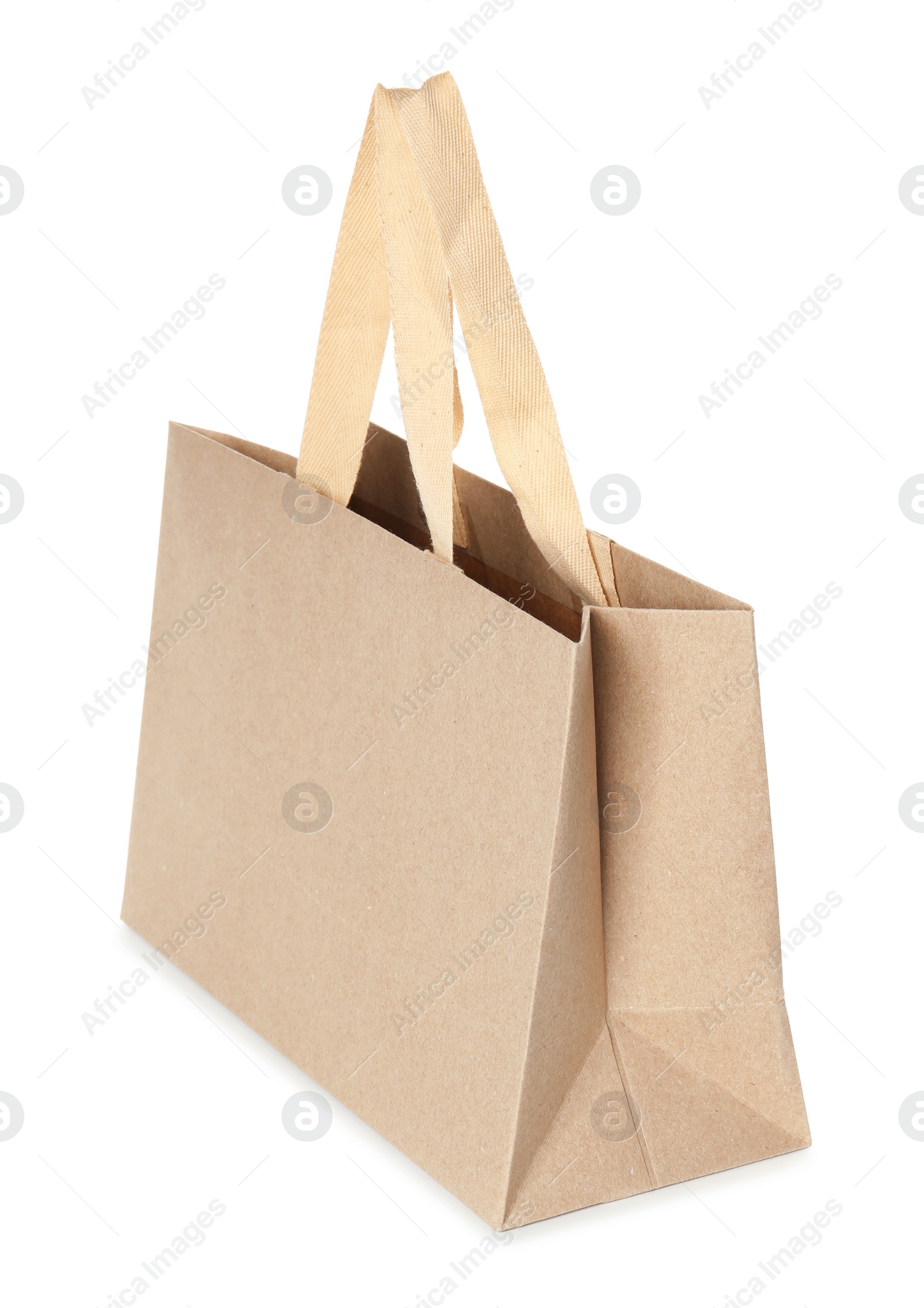 Photo of Paper shopping bag isolated on white. Mock up for design