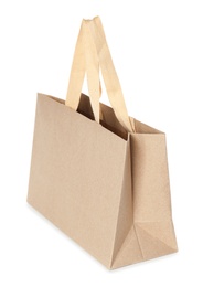 Photo of Paper shopping bag isolated on white. Mock up for design