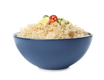 Tasty instant noodles with egg and vegetables in bowl isolated on white