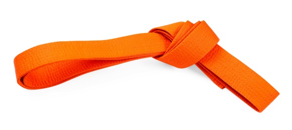 Photo of Orange karate belt isolated on white. Martial arts uniform