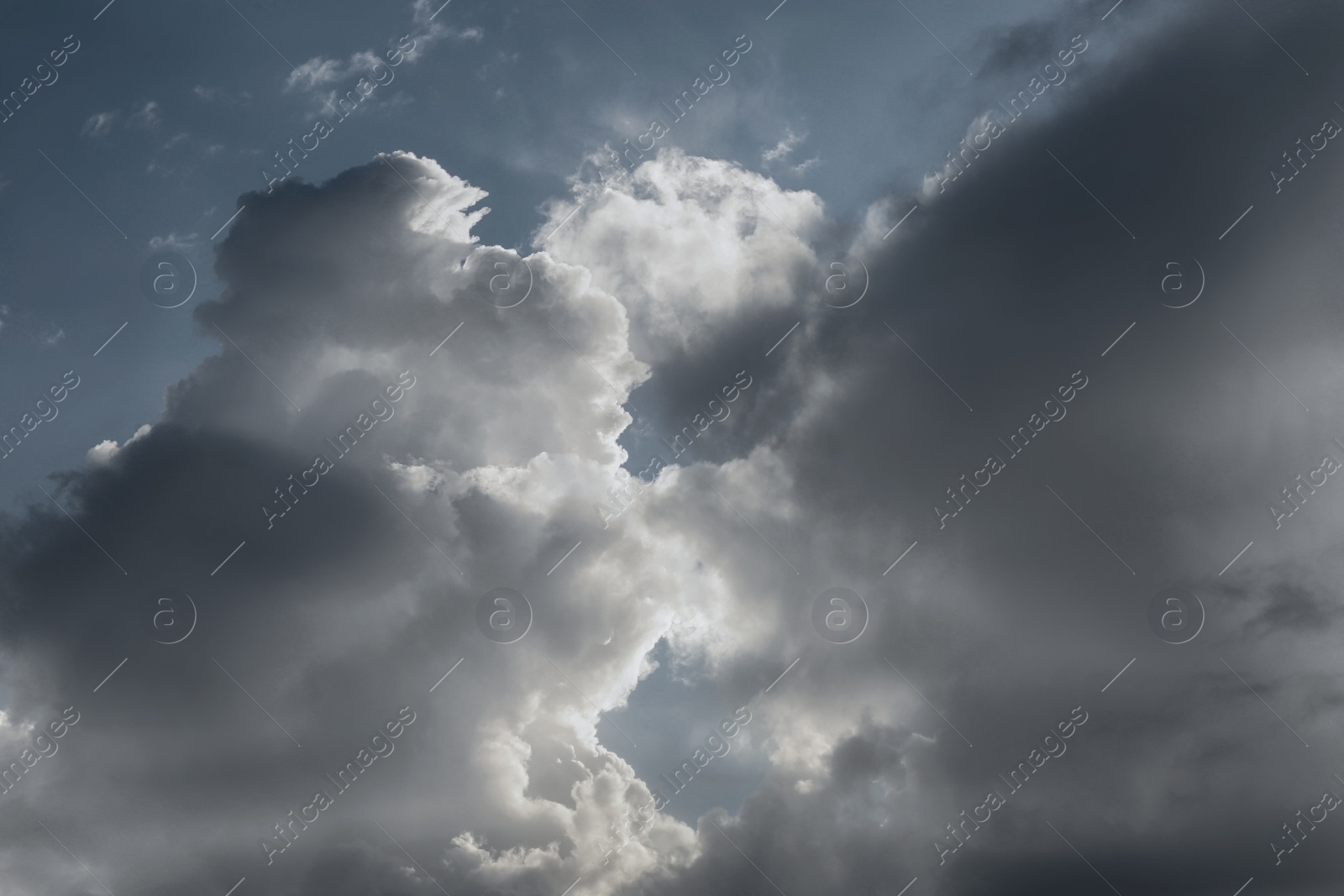 Image of Sky covered with rainy clouds. Stormy weather