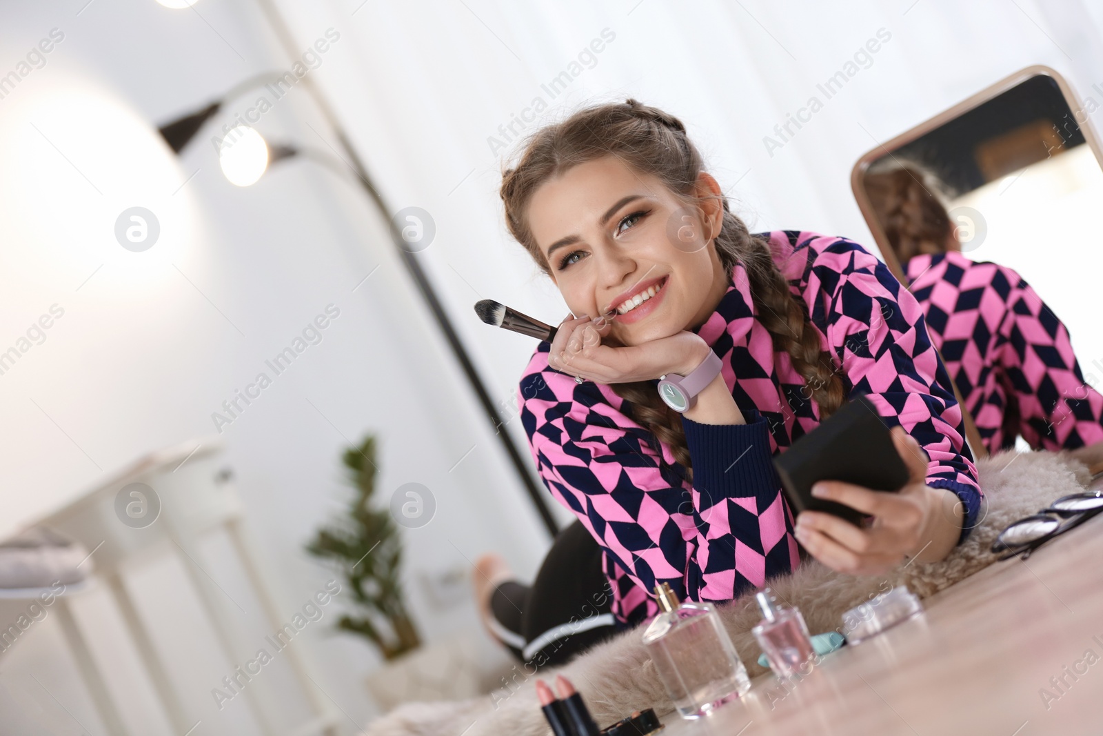 Photo of Portrait of beautiful woman with natural makeup indoors