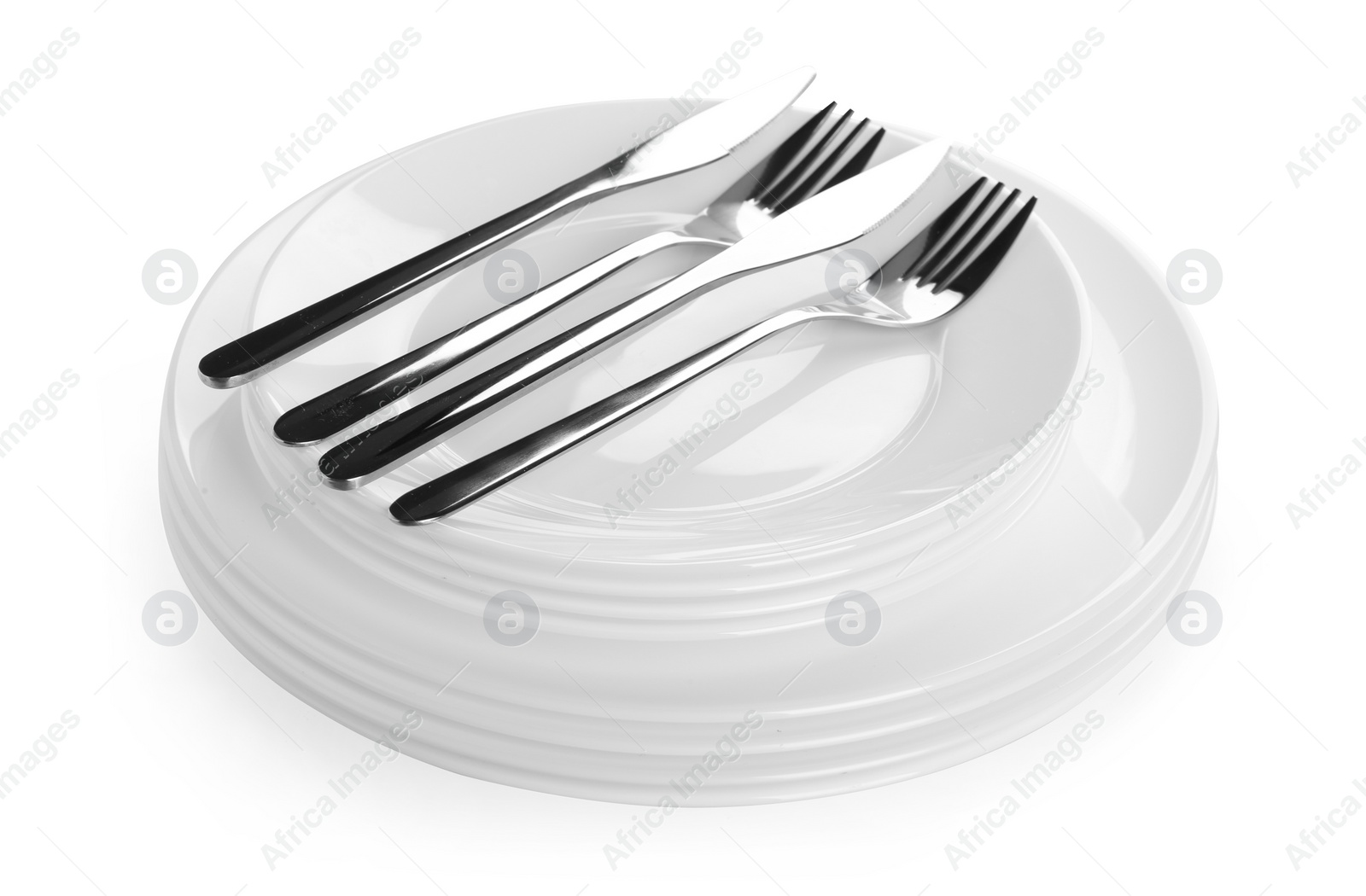 Photo of Stack of plates with forks and knife on white background