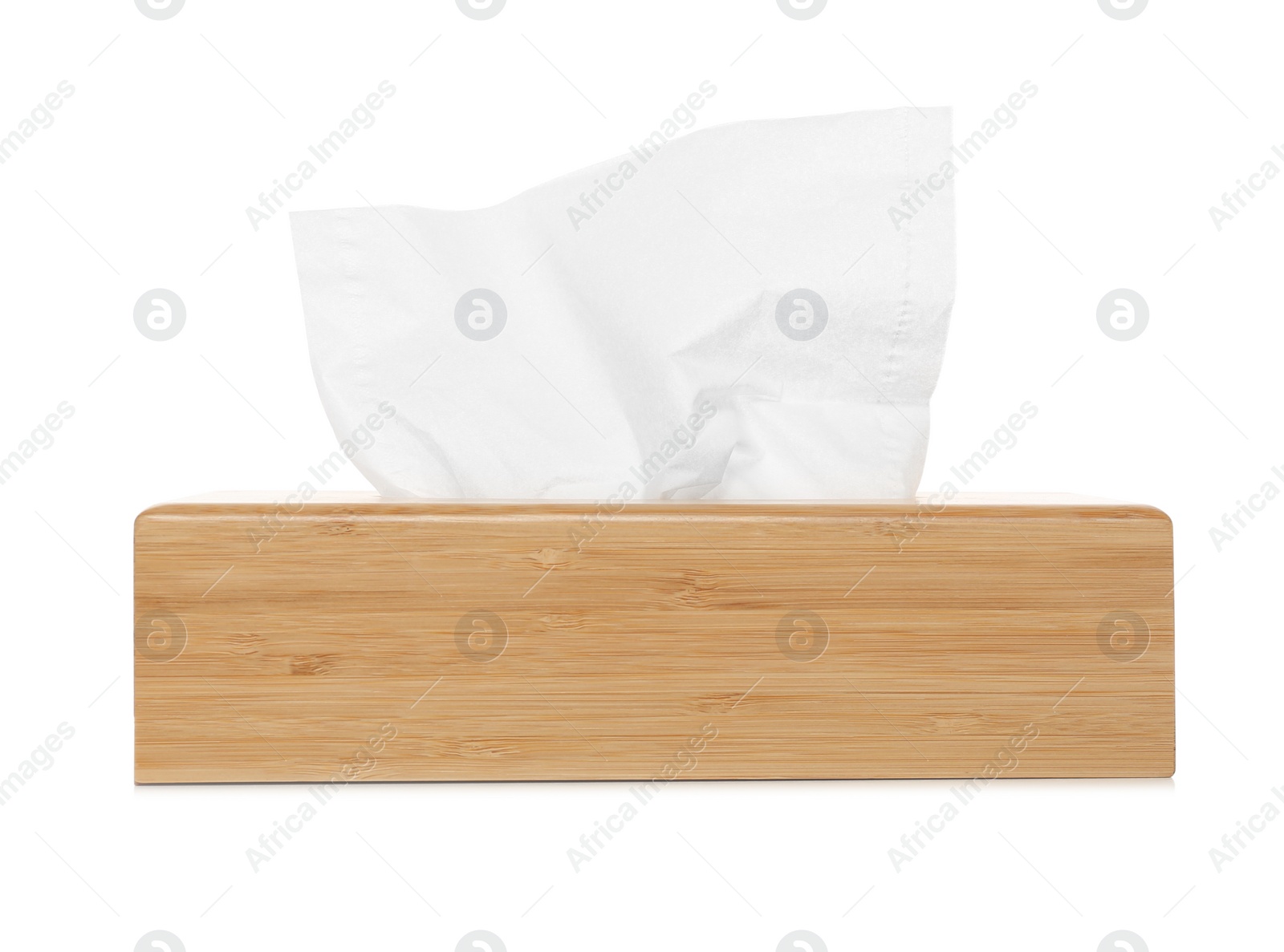 Photo of Wooden holder with paper tissues isolated on white