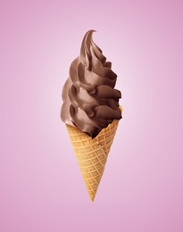 Delicious soft serve chocolate ice cream in crispy cone on pastel violet background