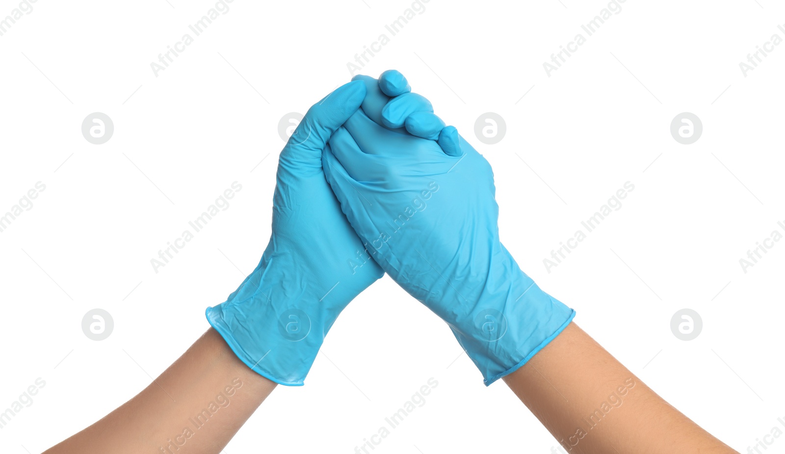 Photo of Doctor in medical gloves shaking hands on white background, closeup