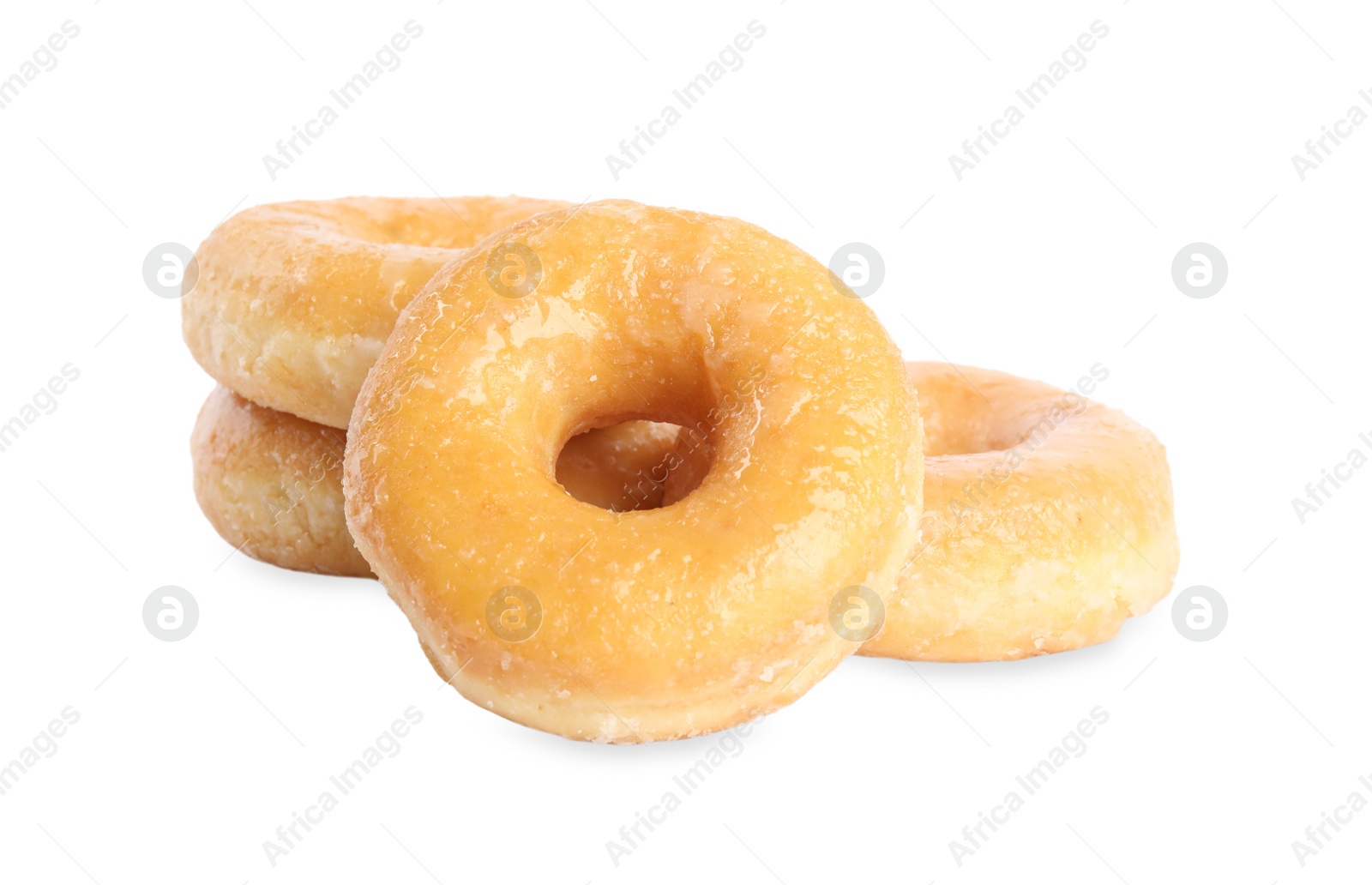 Photo of Sweet delicious glazed donuts on white background