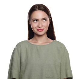 Photo of Embarrassed young woman in shirt on white background