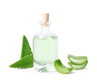 Aloe vera and bottle of juice on white background