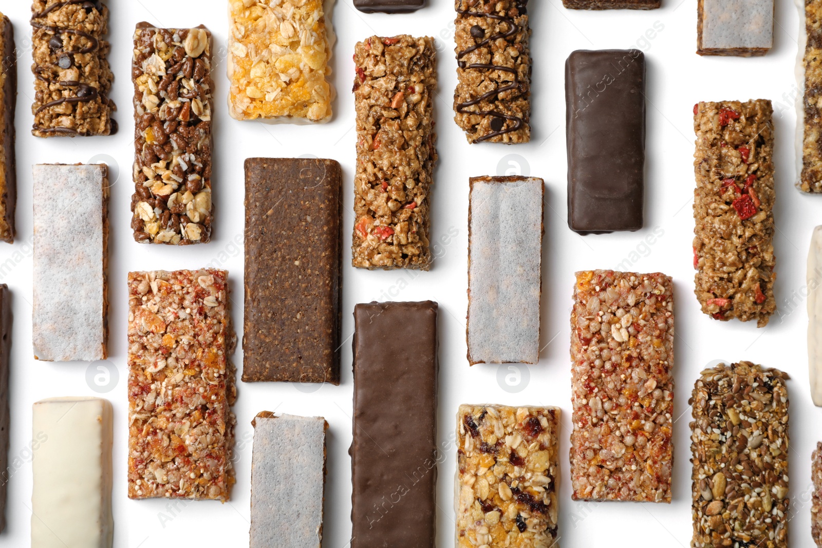 Photo of Flat lay composition with protein bars on white background