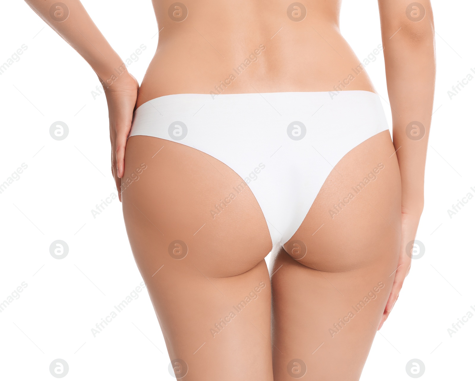 Photo of Slim young woman with smooth gentle skin on white background, closeup. Beauty and body care concept