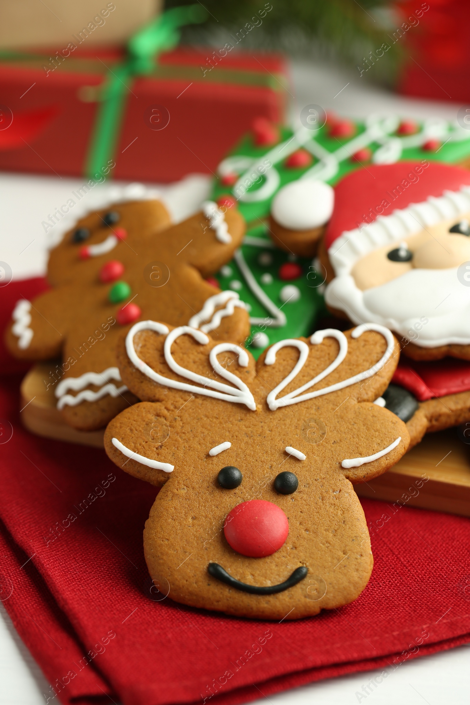 Photo of Tasty homemade Christmas cookies on white table, closeup