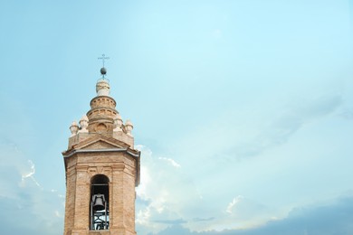 Photo of Exterior of beautiful church against blue sky, low angle view