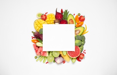 Photo of Composition with organic fresh vegetables, fruits and blank card on white background, top view. Space for text