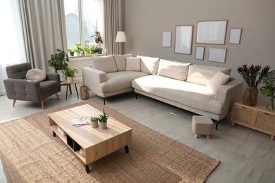 Beautiful living room interior with comfortable sofa