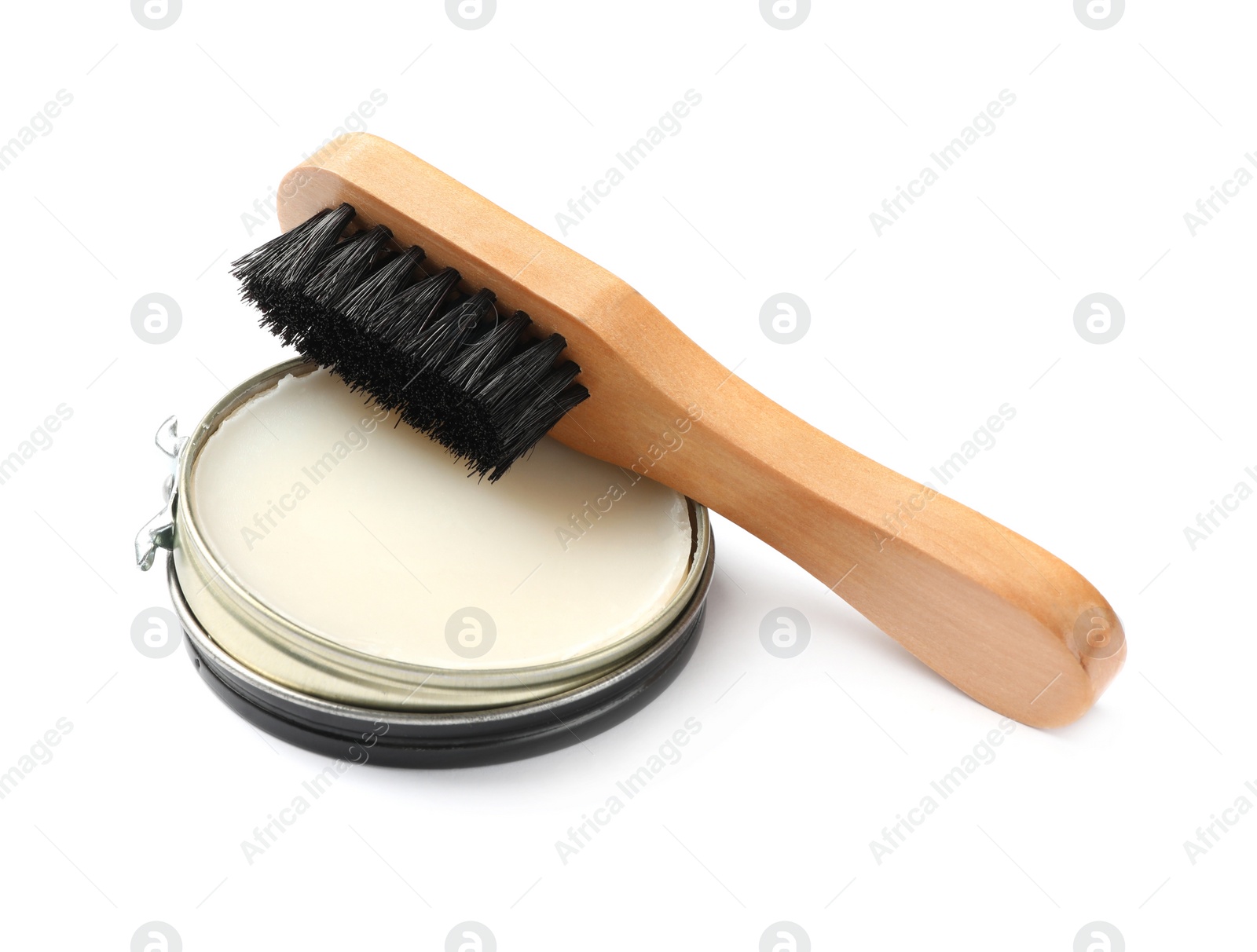 Photo of Wax polish with brush on white background. Shoe care accessories