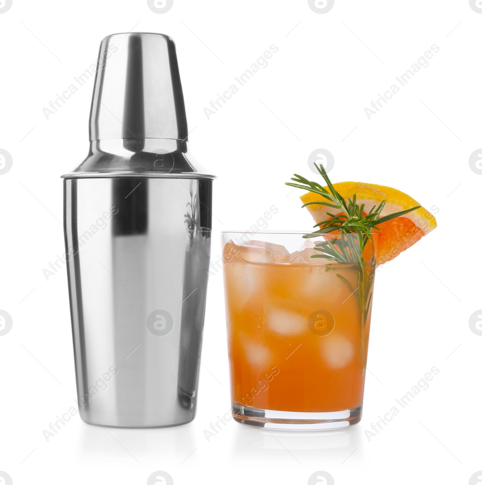 Photo of Metal shaker and delicious cocktail isolated on white