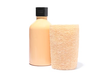 New loofah sponge and bottle of cosmetic product on white background