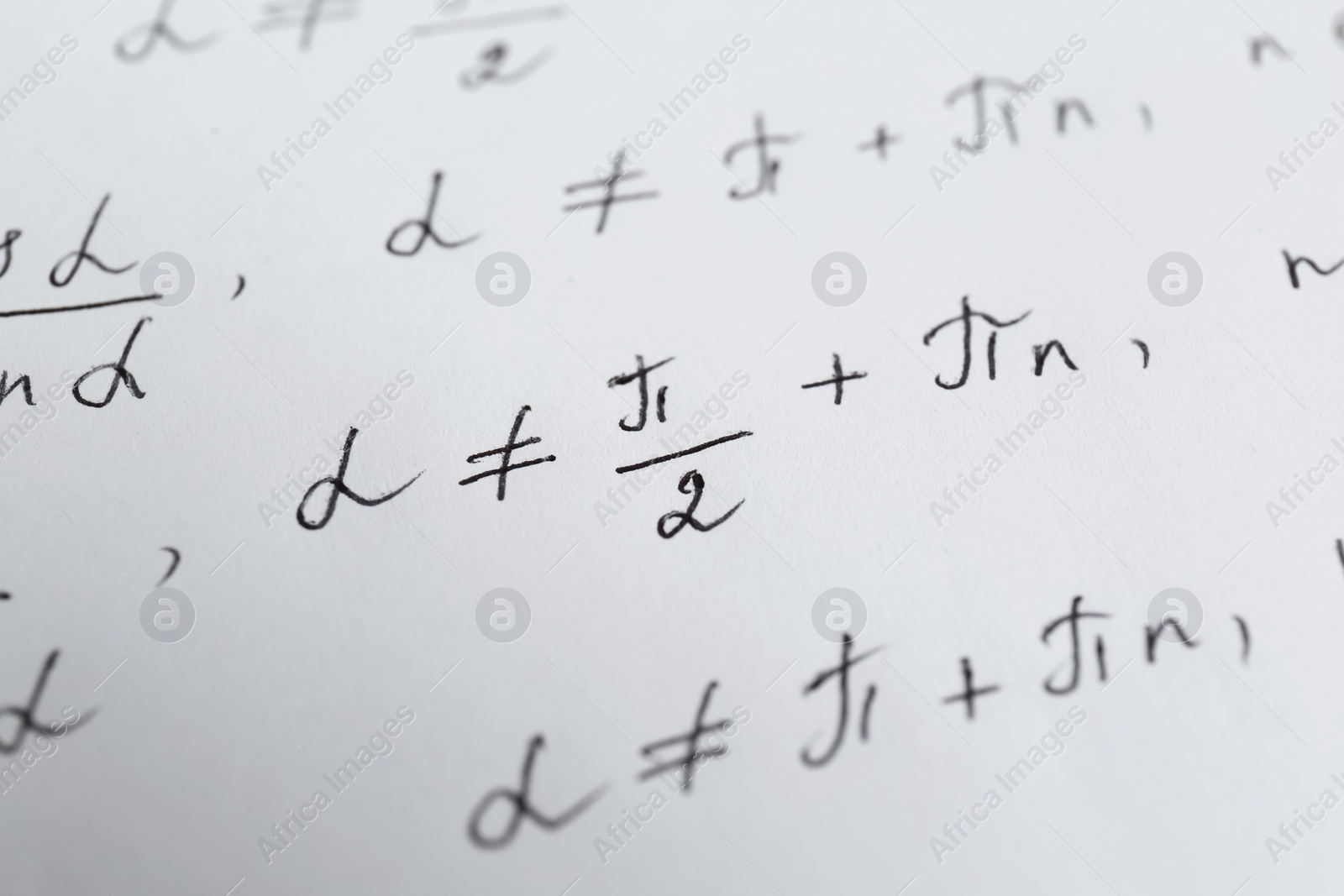 Photo of Sheet of paper with different mathematical formulas, closeup