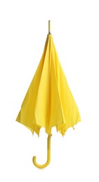 Photo of Stylish closed yellow umbrella isolated on white