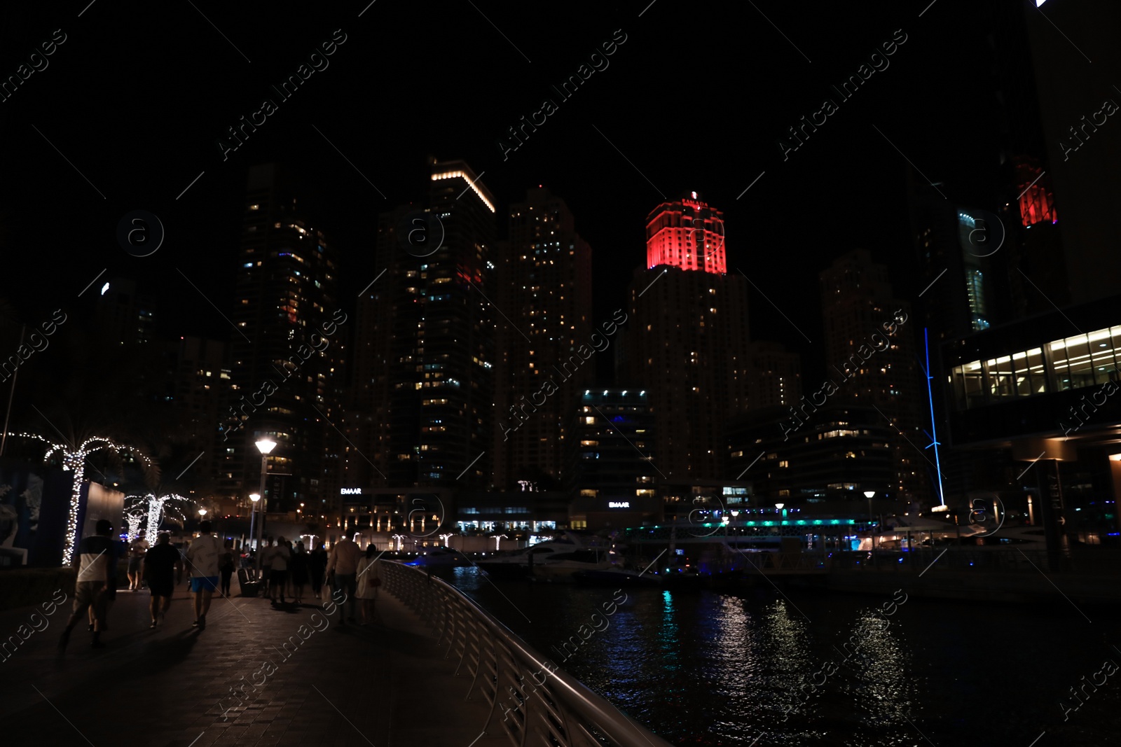 Photo of DUBAI, UNITED ARAB EMIRATES - NOVEMBER 03, 2018: Night cityscape of marina district with illuminated buildings