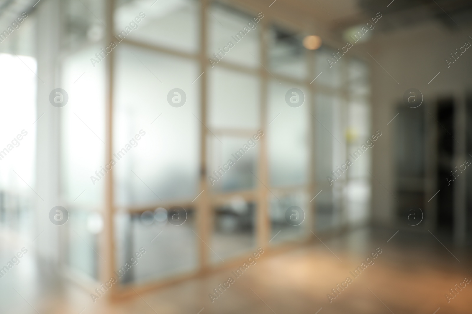 Photo of Blurred view of empty corridor in company