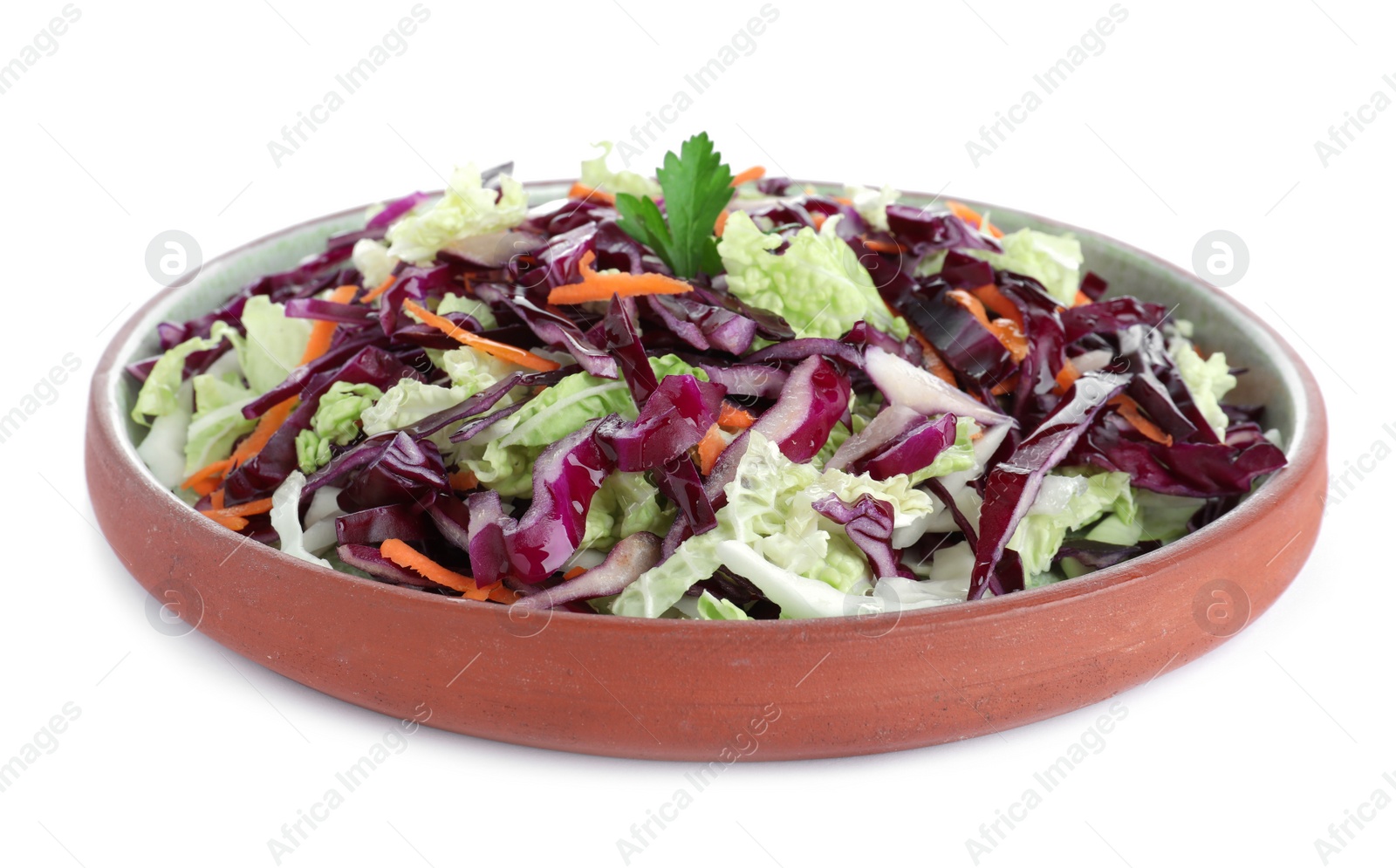 Photo of Fresh cabbage salad in plate isolated on white