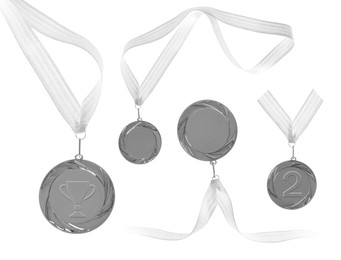 Image of Silver medals with ribbons isolated on white, set