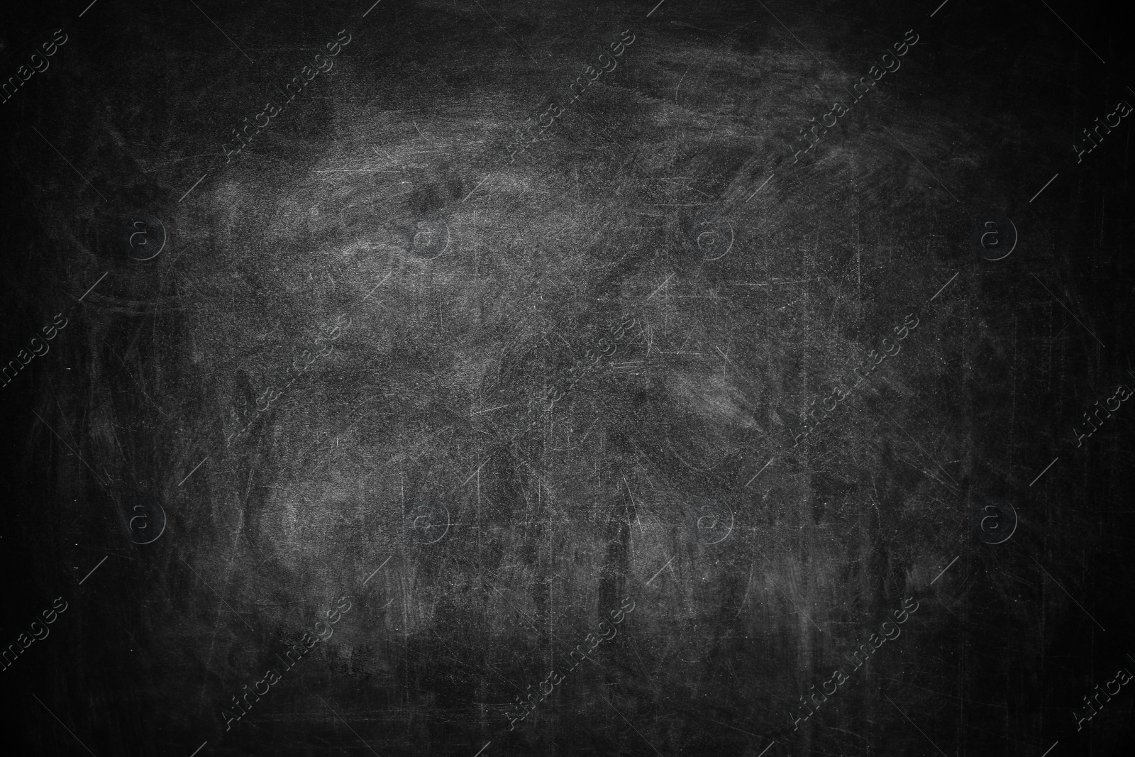 Photo of Dirty black chalkboard as background. Space for text