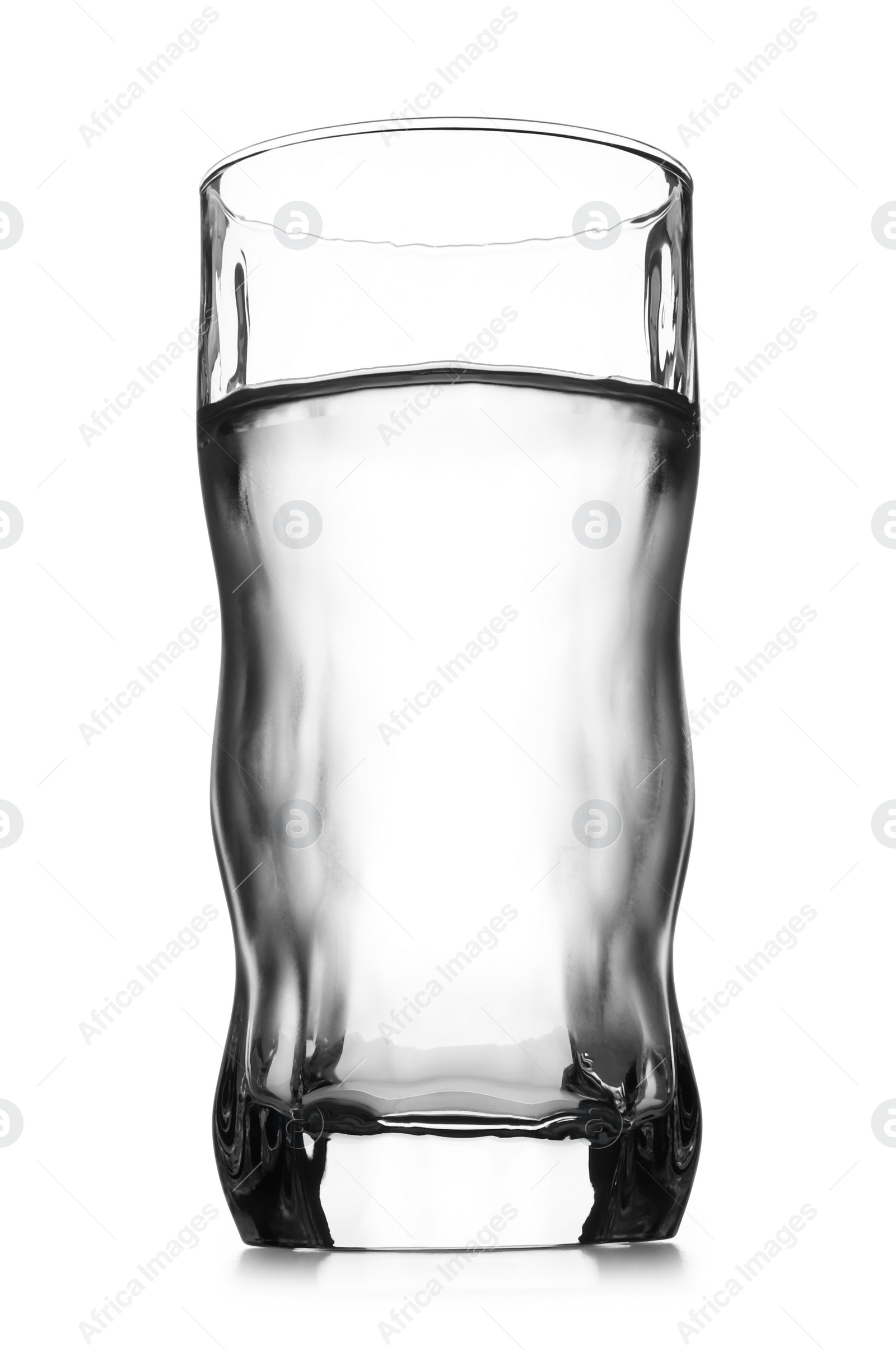 Photo of Glass of cold clear water on white background. Refreshing drink