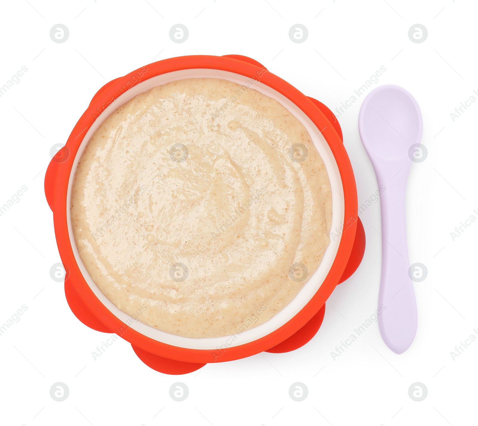 Photo of Tasty baby food in bowl and spoon isolated on white, top view