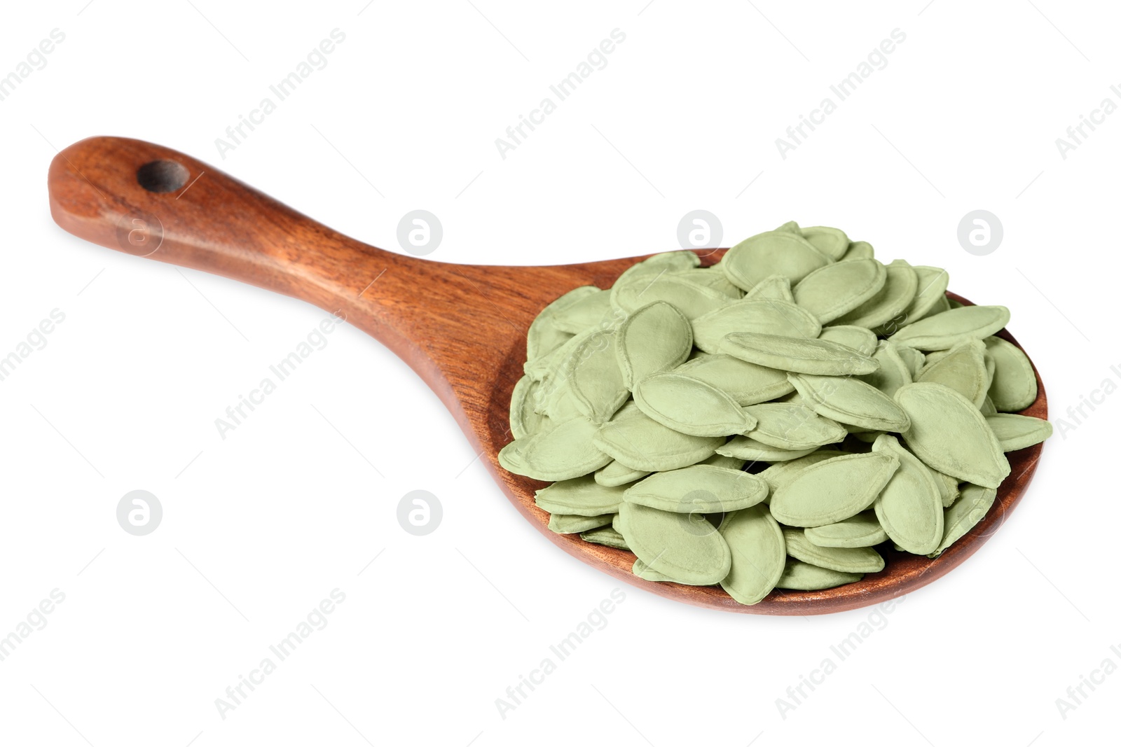 Photo of Wooden spoon with pumpkin seeds isolated on white