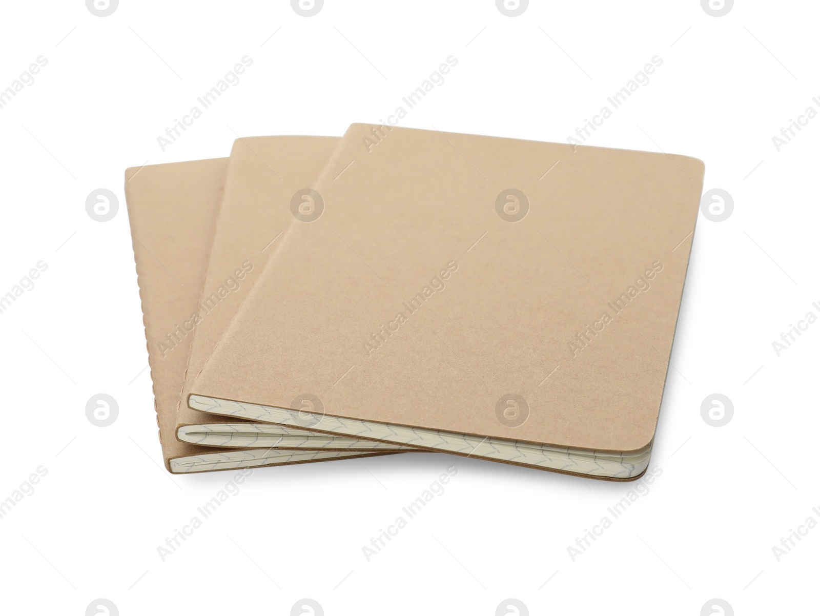 Photo of New stylish kraft planners on white background