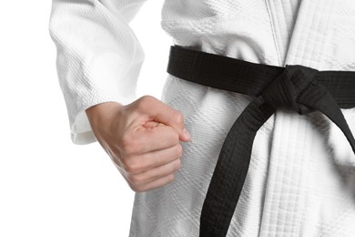 Photo of Karate coach wearing kimono and black belt on white background, closeup