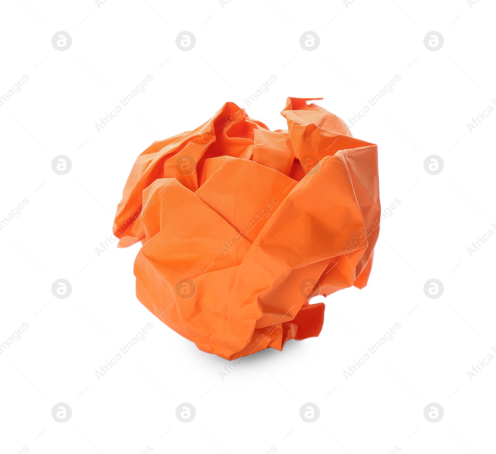 Photo of Crumpled sheet of orange paper isolated on white