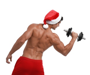 Sexy shirtless Santa Claus with dumbbell on white background