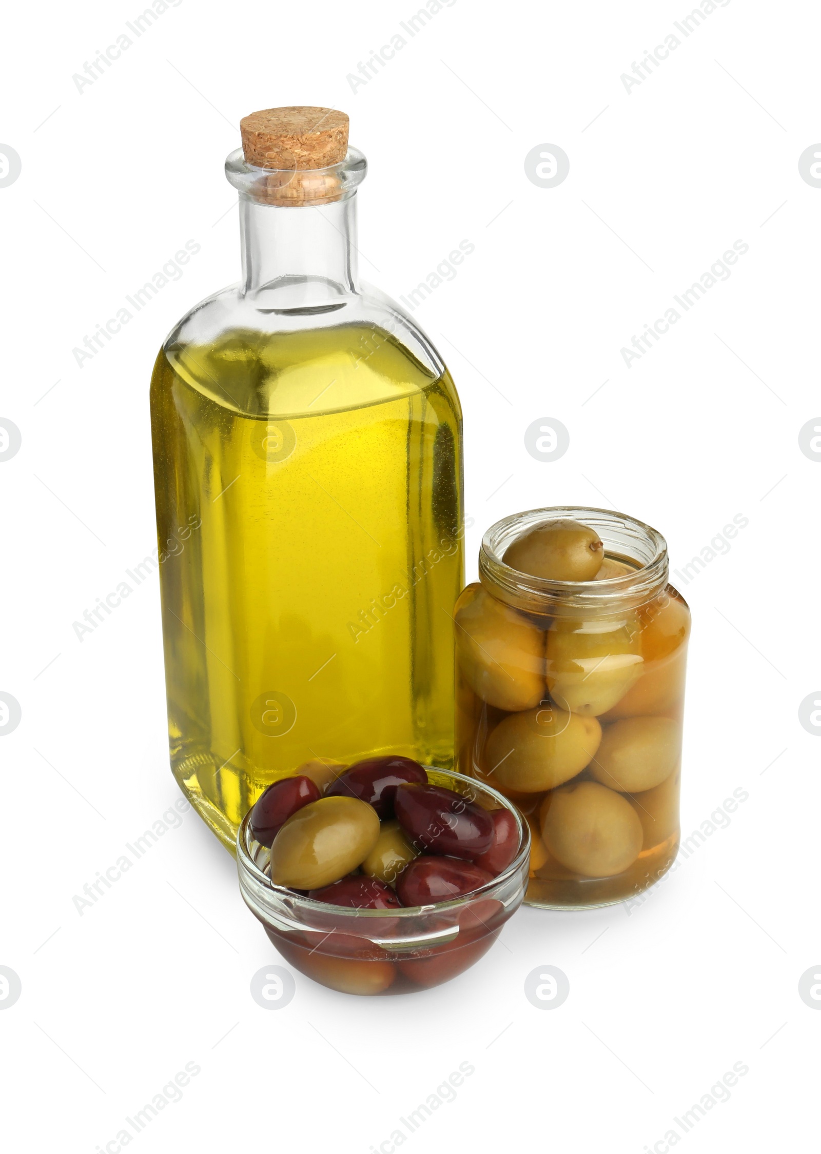 Photo of Vegetable fats. Bottle of cooking oil and olives isolated on white