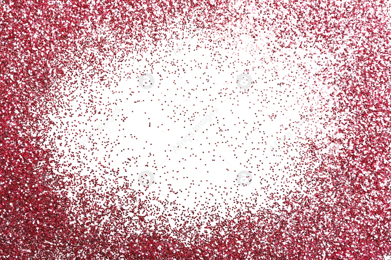 Photo of Pink glitter on white background, top view