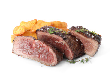 Photo of Delicious sliced beef steak with fried potatoes isolated on white