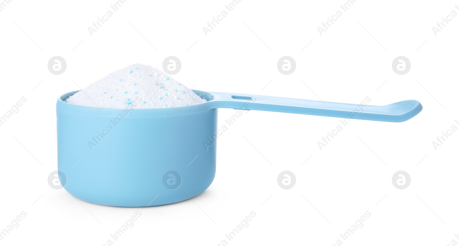 Photo of Laundry detergent in plastic measuring scoop on white background